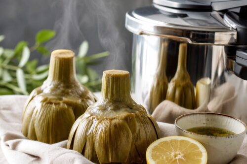 Artichauts cuits à la cocotte-minute égouttés avec citron et sauce simple